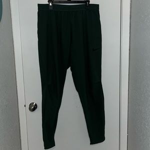 In good condition Kelly Green Nike Pro Joggers